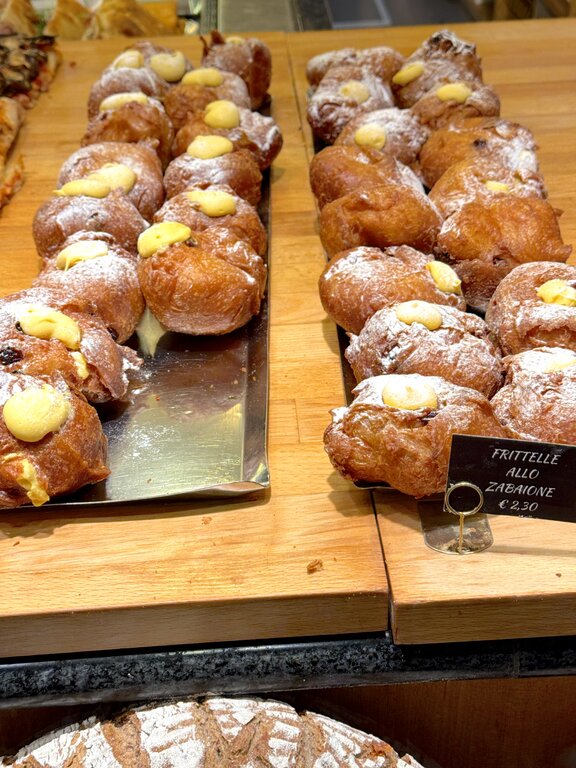 Fritelle with zabaglione on display - visiting Venice in winter
