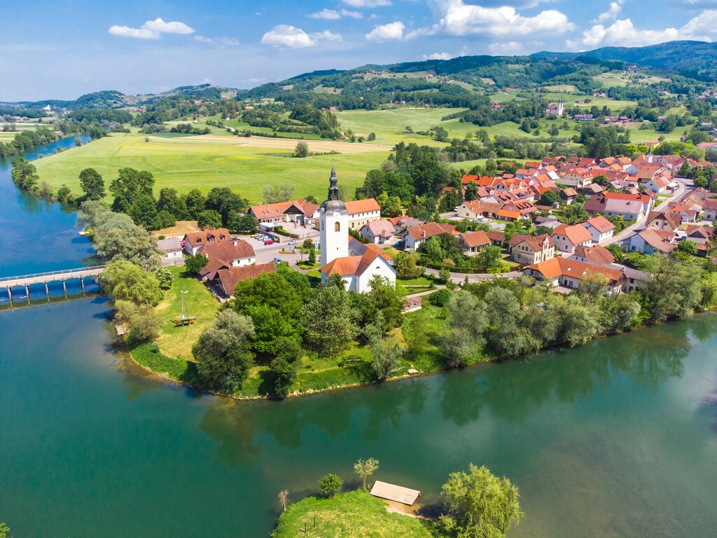 Aerial view of Kostanjevica na Krki medieval town surrounded by Krka River credit DP Kasto