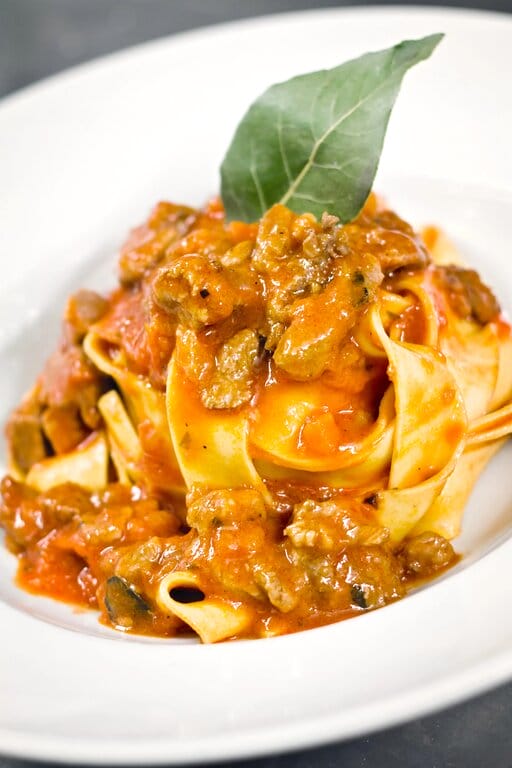 Pappardelle pasta with wild boar - comfort food to eat in Italy