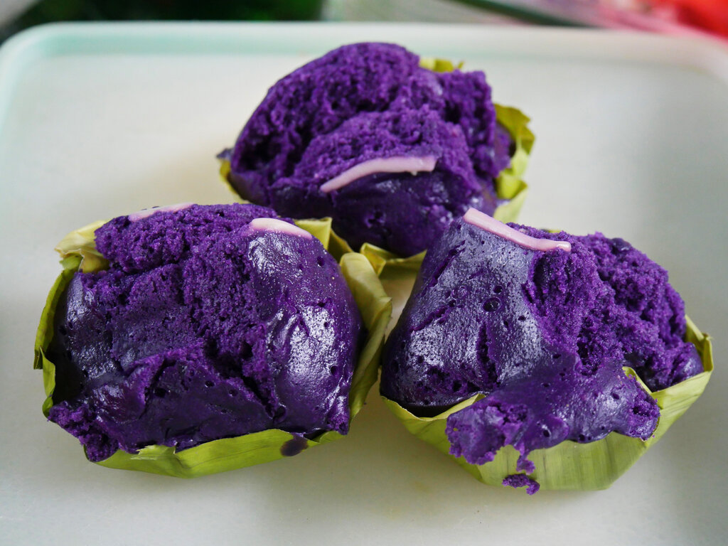 Ube cakes in banana leaves