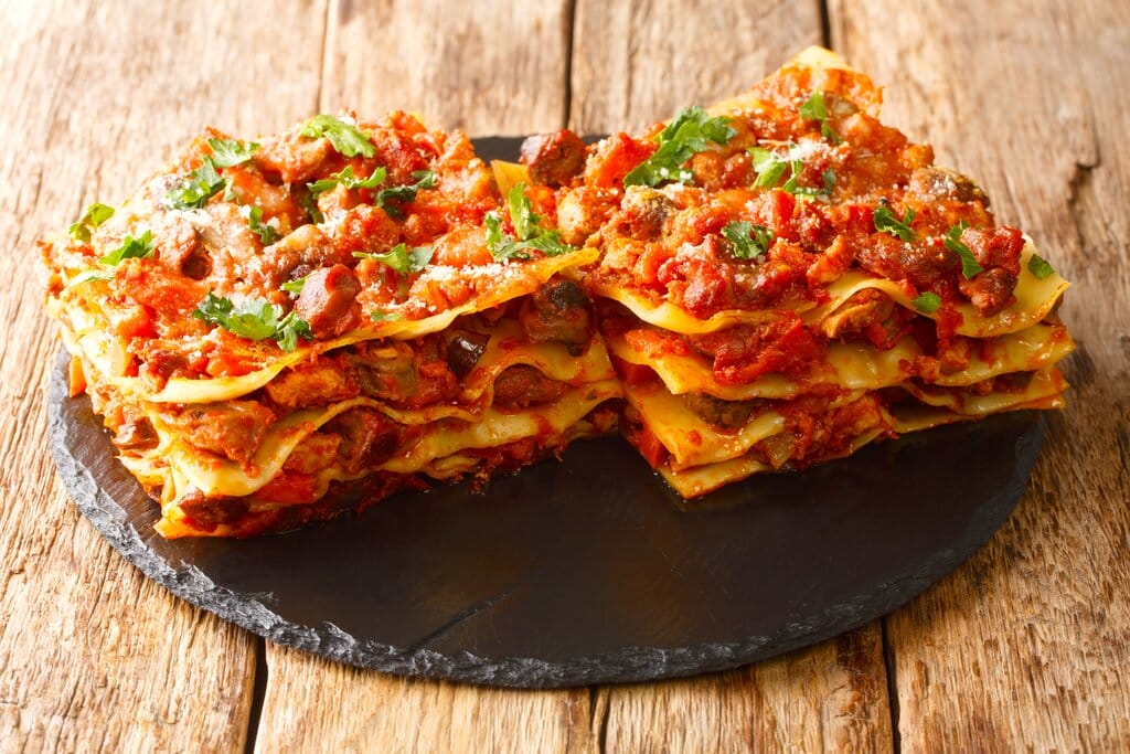 Two portions of vincisgrassi on a plate