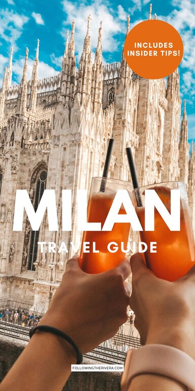 Two people with Aperol spritz in front of the Duomo
