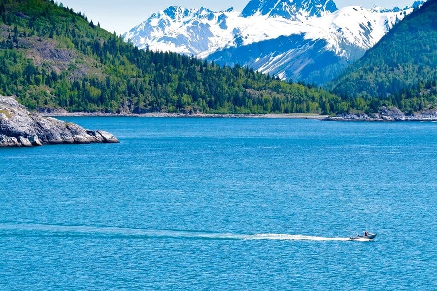 Fishing boat in Glacier Bay National Park - cold places to visit in August in the USA