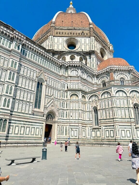 People walking into the Duomo in Florence Italy. Taken by Lisa Rivera
