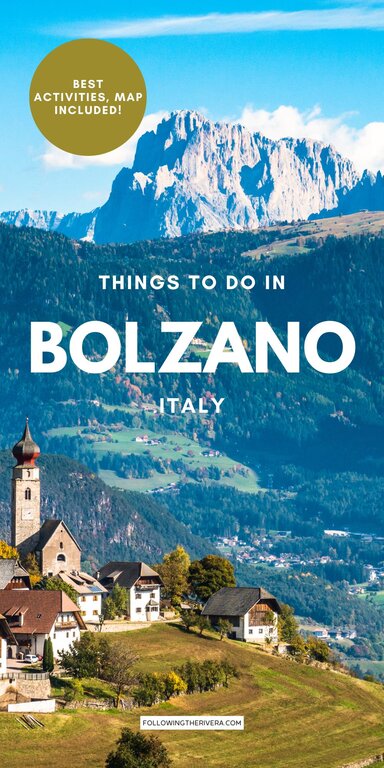 A town in Bolzano, Italy with mountains in the backdrop