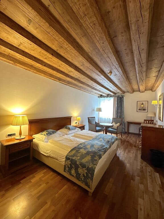 Bedroom inside Hotel Restaurant Lilie in Vipiteno Sterzing