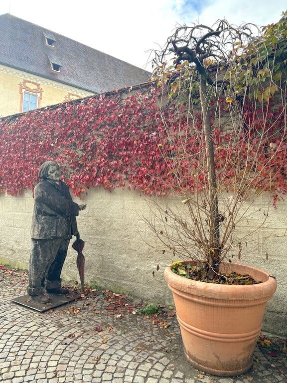 Statue of a man outside Hofburg Bressanone Brixen - best things to do in Bressanone and Vipiteno