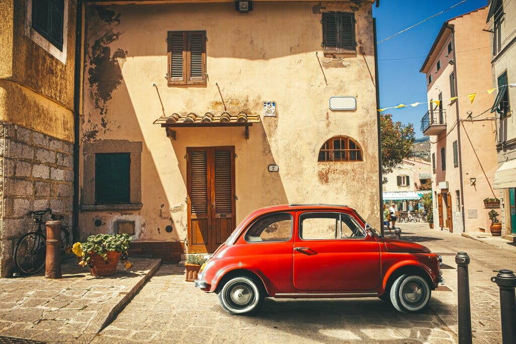 Red vintage Fiat 500 in Tuscany