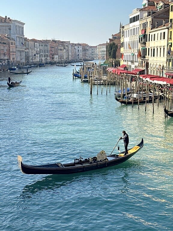 A gondola on the Grand Canal in Venice Italy - planning a trip to Italy