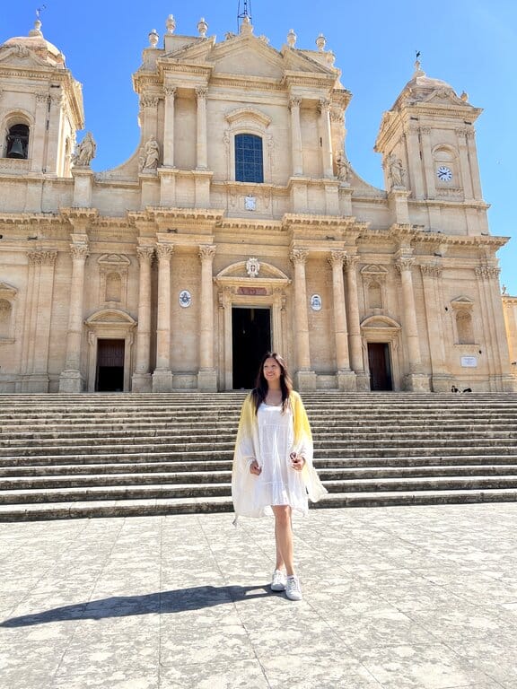 Lisa Rivera outside Noto Cathedral Sicily - best things to do in Noto Sicily