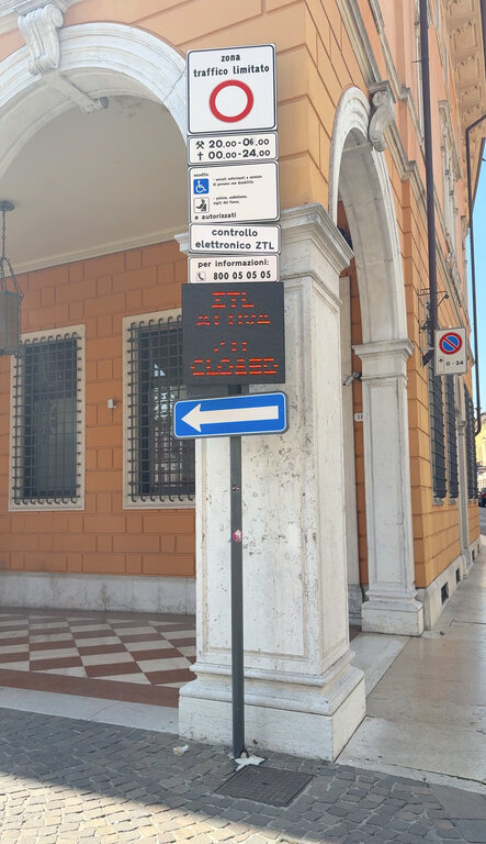 An activated ZTL restricted traffic zone sign in a town in northern Italy, a common cause of unexpected fines for visitors driving in Italian city centers