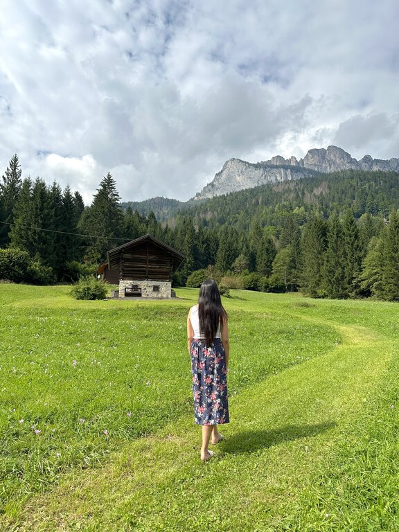 Lisa Rivera walking in the Dolomites in summer