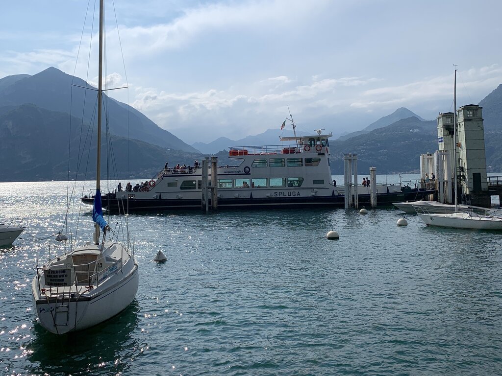 A ferry transporting passengers in Lake Como - how to get around Lake Como without a car