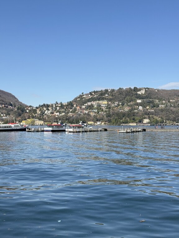 Lake Como with hills in background