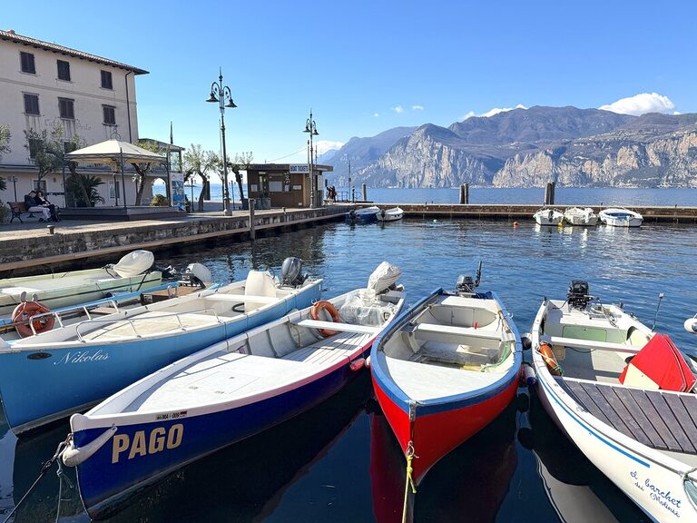 Boats on the water at Malcesine Lake Garda - how to get to Lake Garda Italy