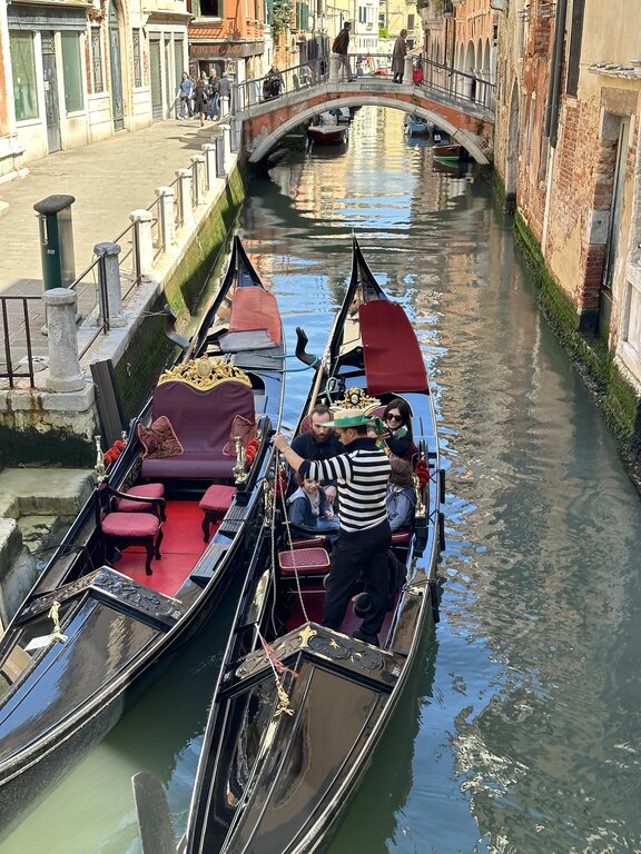 Two gondolas in a canal in Venice Italy