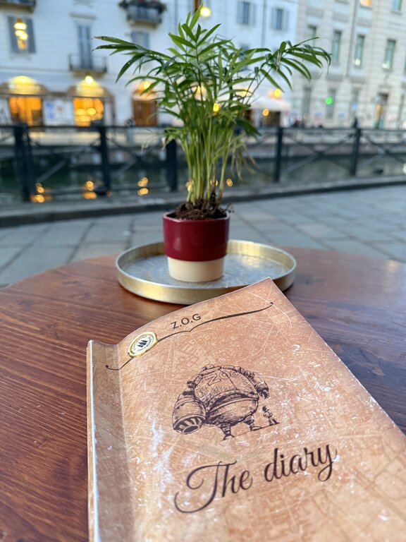 A drinks menu on the table in Navigli Milan