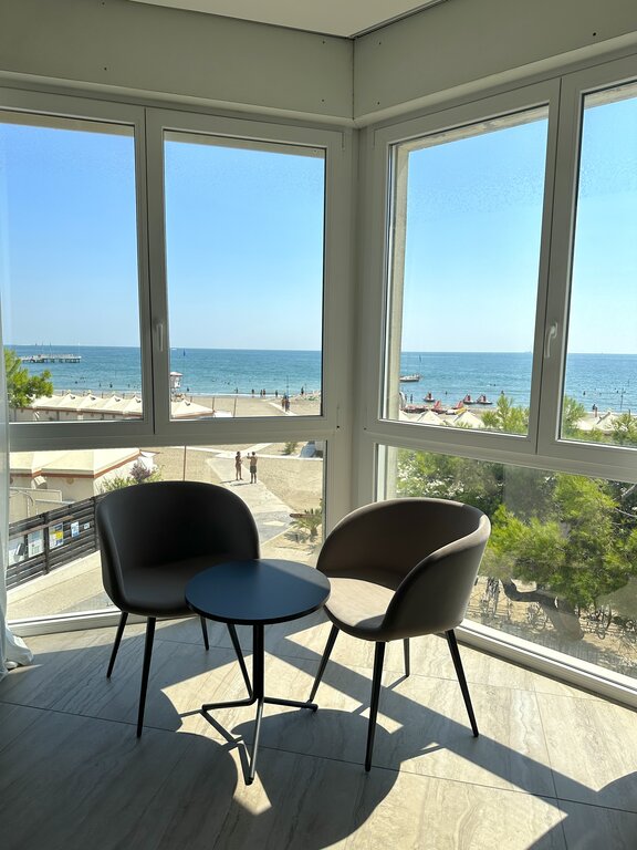 The table and chairs with a view at Hotel Petit Palais in Lido of Venice