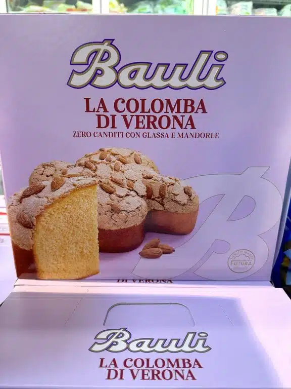 The iconic purple packaging of a Bauli Colomba di Verona, a classic Italian dove-shaped Easter cake found in homes across Italy