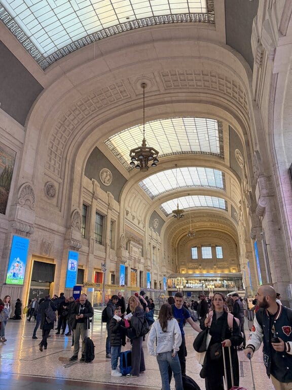 Passengers inside Milano Centrale train station, Milan