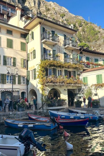 Boats in Porto Vecchio harbor in Limone sul Garda in November in Italy