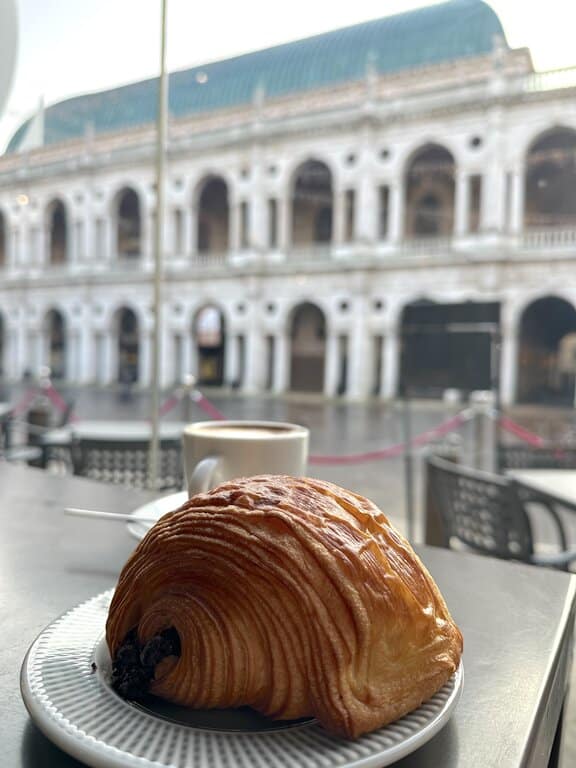 Brioche in front of the Basilica Palladiana in Vicenza Italy in December on Christmas Day